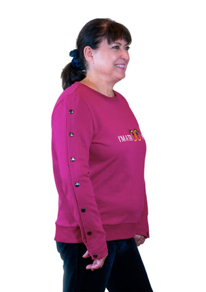 Woman wearing Dialysis shirt with easy dual arm accesses port, Hemowear. I’m a trooper side view